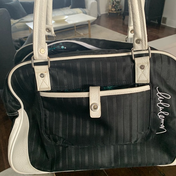 lululemon athletica Handbags - Lululemon black and white gym carry on duffle bag.